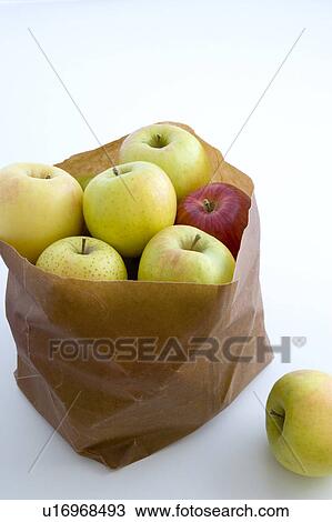Stock Image - Apples in a brown paper bag. Fotosearch