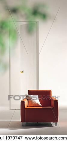 Stock Photo - Armchair by a door. Fotosearch