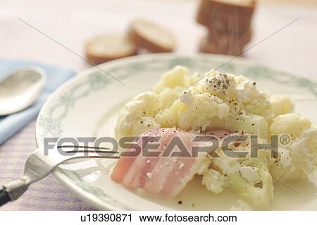 Stock Image - Bacon with cauliflower and cheese. Fotosearch
