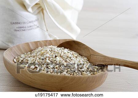 Bag of wheat and wooden bowl of mixed grains View Large Photo Image Stock Photo - Bag of wheat and wooden bowl of mixed grains. Fotosearch