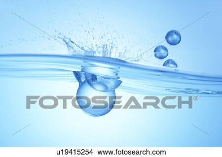 Balls dropped in water, blue background View Large Photo Image Picture - Balls dropped in water, blue background. Fotosearch