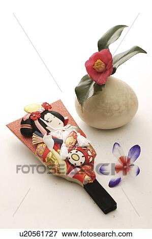 Battledore, shuttlecock and a camellia in a vase View Large Photo Image Stock Photo - Battledore, shuttlecock and a camellia in a vase. Fotosearch