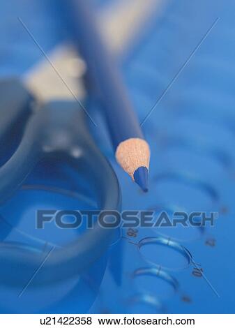 Stock Photo - Blue scissors, pencil and ruler. Fotosearch