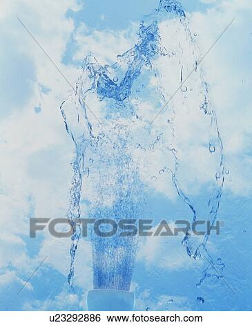 Stock Photograph - Blue sky and a spray of water. Fotosearch