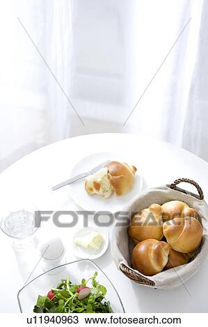 Bread and salad on a table View Large Photo Image Stock Image - Bread and salad on a table. Fotosearch