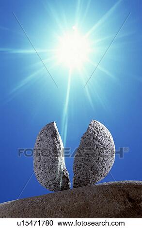 Stock Image - Broken rock under the sun. Fotosearch