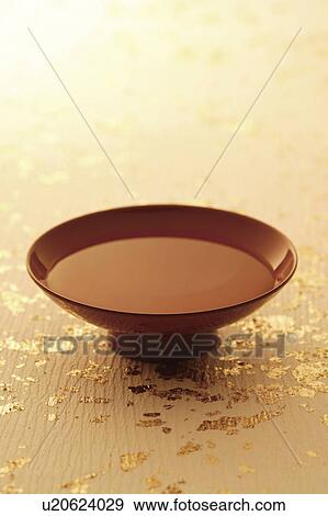 Stock Photo - Brown saki cup. Fotosearch