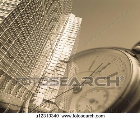 Stock Image - Building and a clock. Fotosearch