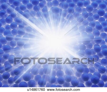 Burst of light in blue spheres View Large Photo Image Stock Image - Burst of light in blue spheres. Fotosearch