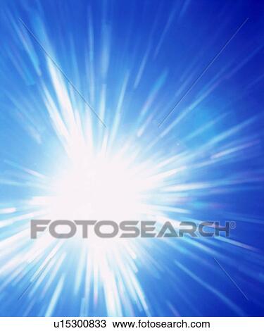 Stock Image - Burst of light on blue background. Fotosearch