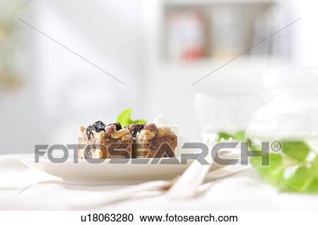 Cake and herbal tea View Large Photo Image Stock Image - Cake and herbal tea. Fotosearch