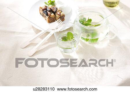 Cake and herbal tea View Large Photo Image Stock Image - Cake and herbal tea. Fotosearch