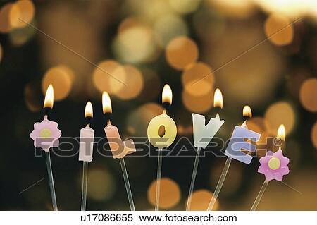 Candles in front of Christmas tree View Large Photo Image Stock Photography - Candles in front of Christmas tree. Fotosearch
