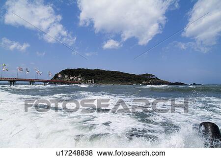 Stock Photo - Carp streamers on bridge over sea. Fotosearch
