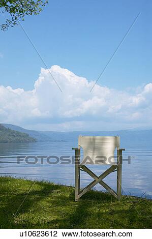 Stock Image - Chair by the lake, Towada, Aomori Prefecture, Japan. Fotosearch