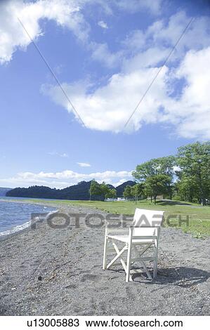 Stock Image - Chair by the lake, Towada, Aomori Prefecture, Japan. Fotosearch