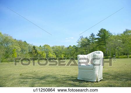 Picture - Chair in a field, Karuizawa, Nagano Prefecture, Japan. Fotosearch