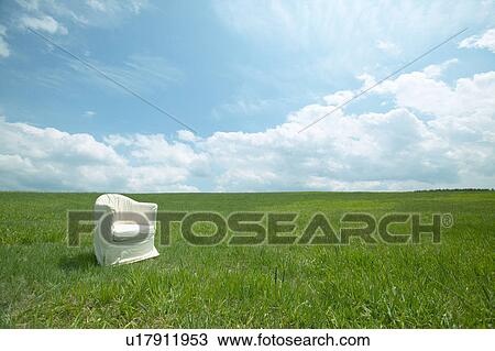 Stock Image - Chair in a field, Karuizawa, Nagano Prefecture, Japan. Fotosearch