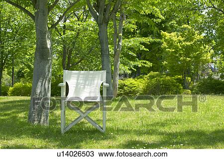 Stock Image - Chair in a park, Suzaka, Nagano Prefecture, Japan. Fotosearch