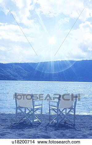 Picture - Chairs by the lake, Towada, Aomori Prefecture, Japan. Fotosearch