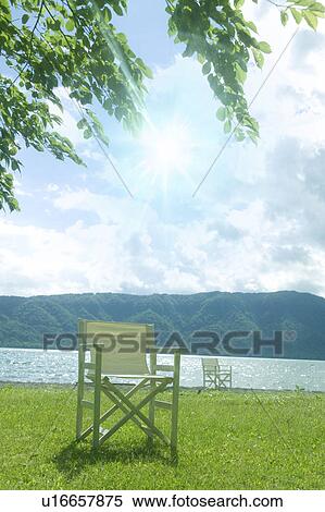 Chairs by the lake, Towada, Aomori Prefecture, Japan View Large Photo Image Stock Photography - Chairs by the lake, Towada, Aomori Prefecture, Japan. Fotosearch
