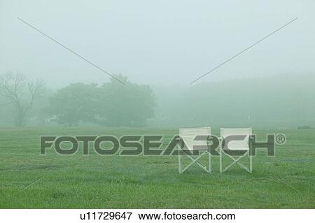 Stock Photo - Chairs in a misty field, Aomori Prefecture, Japan. Fotosearch
