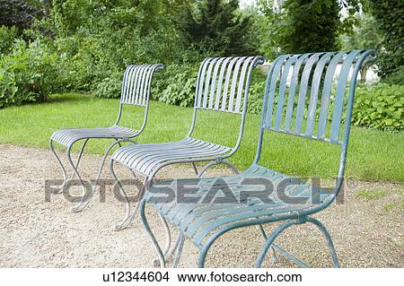 Chairs in a park, Nancy, France View Large Photo Image Picture - Chairs in a park, Nancy, France. Fotosearch