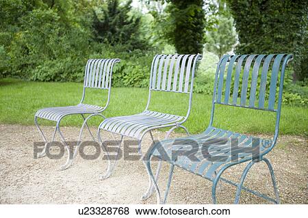Stock Photo - Chairs in a park, Nancy, France. Fotosearch