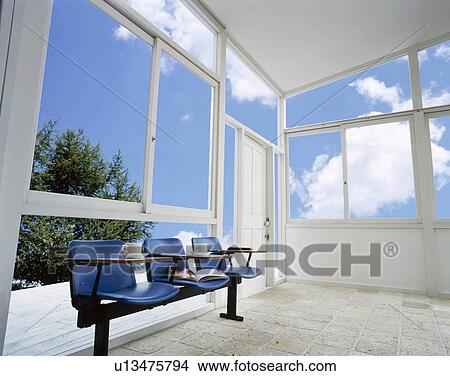 Chairs in conservatory with coffee cups View Large Photo Image Picture - Chairs in conservatory with coffee cups. Fotosearch