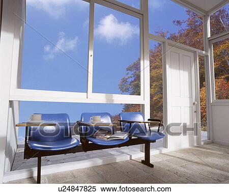 Stock Photography - Chairs in conservatory with coffee cups. Fotosearch