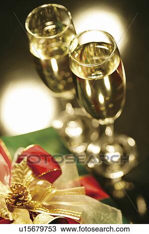 Champagne and Christmas presents View Large Photo Image Stock Image - Champagne and Christmas presents. Fotosearch