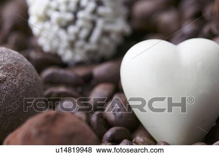 Chocolate and coffee beans View Large Photo Image Stock Photo - Chocolate and coffee beans. Fotosearch