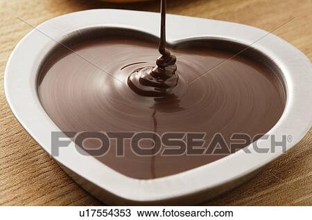 Chocolate in a heart shaped mould View Large Photo Image Stock Image - Chocolate in a heart shaped mould. Fotosearch
