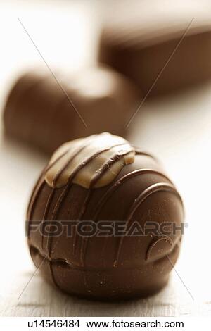 Chocolate pieces View Large Photo Image Picture - Chocolate pieces. Fotosearch