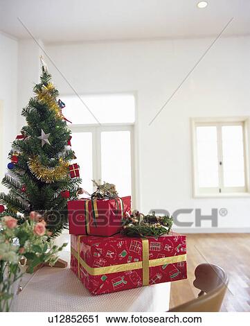 Christmas presents by the tree. View Large Photo Image Stock Image - Christmas presents by the tree.. Fotosearch