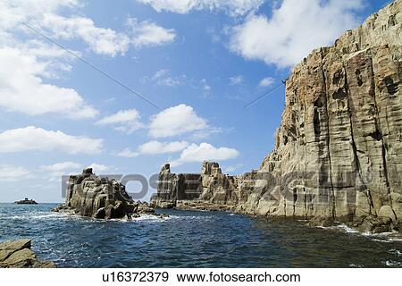 Cliffs next to sea, Tojinbo, Sakai, Fukui Prefecture, Japan View Large Photo Image Stock Photo - Cliffs next to sea, Tojinbo, Sakai, Fukui Prefecture, Japan. Fotosearch