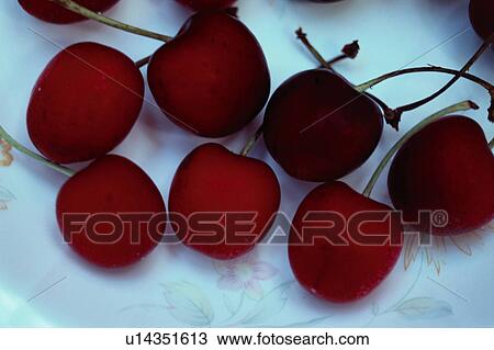 Stock Image - Close Up Image of Cherries on Plate. Fotosearch