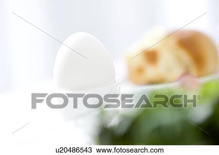 Stock Image - Close-up of a boiled egg. Fotosearch