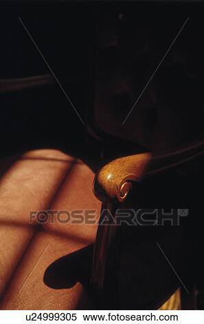 Close-up of a chair with wooden armrest View Large Photo Image Stock Photography - Close-up of a chair with wooden armrest. Fotosearch