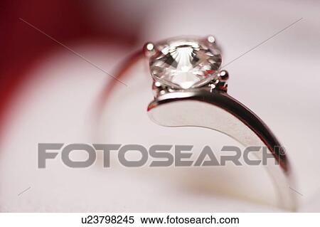 Close-up of a silver diamond ring View Large Photo Image Stock Photography - Close-up of a silver diamond ring. Fotosearch