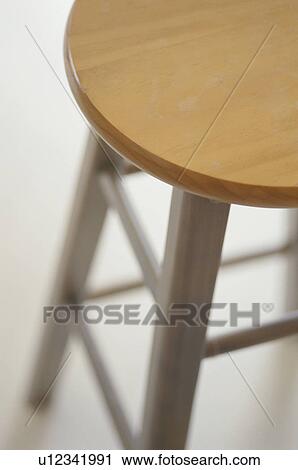 Close-up of wooden stool View Large Photo Image Stock Image - Close-up of wooden stool. Fotosearch