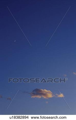 Cloud in a blue sky View Large Photo Image Picture - Cloud in a blue sky. Fotosearch
