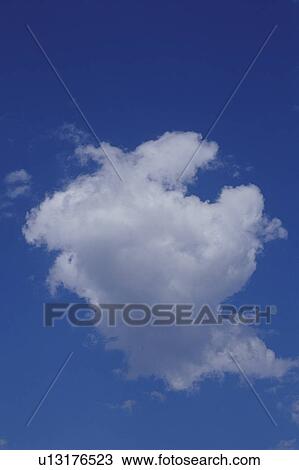 Cloud in a blue sky View Large Photo Image Stock Image - Cloud in a blue sky. Fotosearch
