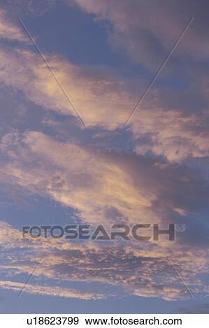 Clouds at sunset View Large Photo Image Stock Photo - Clouds at sunset. Fotosearch