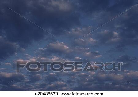 Clouds glowing in the sky View Large Photo Image Stock Image - Clouds glowing in the sky. Fotosearch