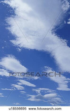 Stock Photography - Clouds in a blue sky. Fotosearch