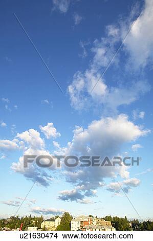 Picture - Clouds in blue sky. Fotosearch