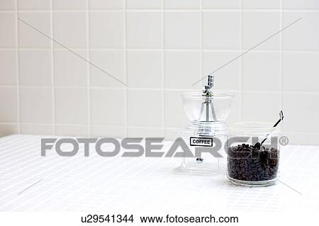 Coffee beans and a coffee grinder View Large Photo Image Picture - Coffee beans and a coffee grinder. Fotosearch