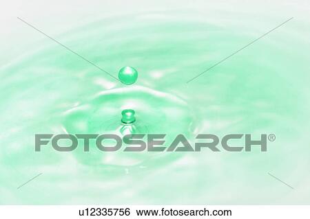 Colored liquid drops View Large Photo Image Stock Photograph - Colored liquid drops. Fotosearch