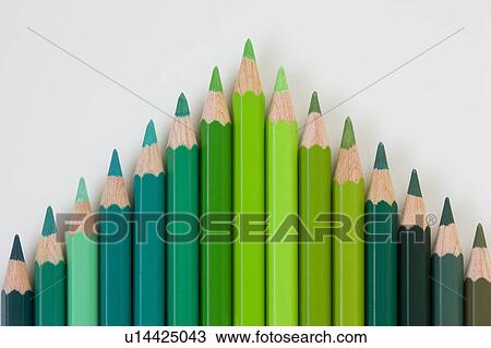 Stock Image - Colored pencils in shades of green. Fotosearch